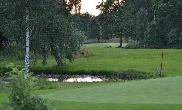 Älmhults Golfklubb logotyp